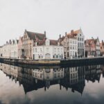 België